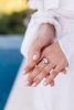 Close Outdoor Shot Of Womans Hands Wearing Ring
