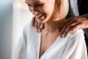 Cropped View Man Putting Hands On Shoulders Of Cheerful Woman