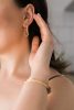 Detail Of Young Woman Wearing Beautiful Luxury Earring. Handmade Jewellery And Accessories