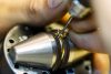 Jeweler Working On A Ring